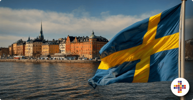 Swedish flag waving with Stockholm city skyline in the background.