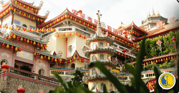 Colorful temple decorated for World Methodist Evangelism celebration with traditional architecture.