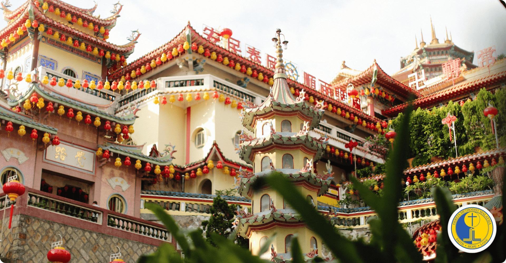 Colorful temple decorated for World Methodist Evangelism celebration with traditional architecture.