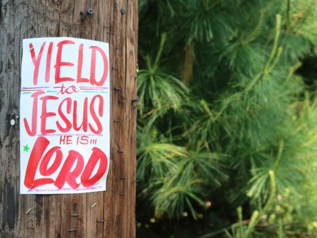 Sign encouraging faith and evangelism at World Methodist Evangelism.