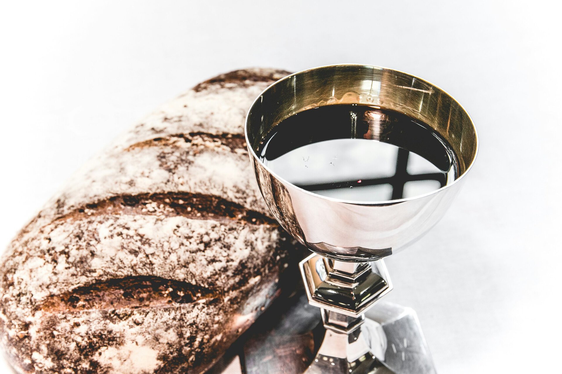 Bread and wine for Holy Communion in Christian worship ceremony.